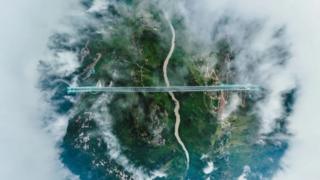BASE jumpers take flight from world's highest bridge in China - BELT ...